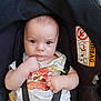 Théo participe au concours pour gagner de l'argent avec cette photo : baby, black_cover, car_seat, child, clothing, cute, expression, face, hands, indoor, infant, onesie, pacifier, portrait, seatbelt, sitting, straps, toy, warning_label, young