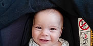 Théo a rejoint le concours — aidez-le/la à gagner de superbes lots ! baby, car_seat, smiling, child, infant, onesie, pacifier, happy, face, cute, seatbelt, safety, portrait, indoors, baby_clothing, childhood, human, small_hands, cheerful, young