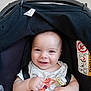 baby, car_seat, smiling, child, infant, onesie, pacifier, happy, face, cute, seatbelt, safety, portrait, indoors, baby_clothing, childhood, human, small_hands, cheerful, young