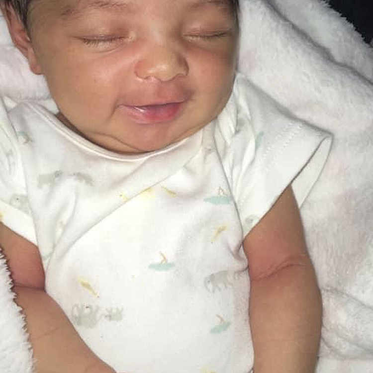 Zoey joined the competition — help win amazing prizes! baby, baby_toddler_clothing, cheek, chin, comfort, ear, eyebrow, facial_expression, gesture, hand, human, iris, lip, mouth, neck, nose, skin, sleeve, thumb, toddler