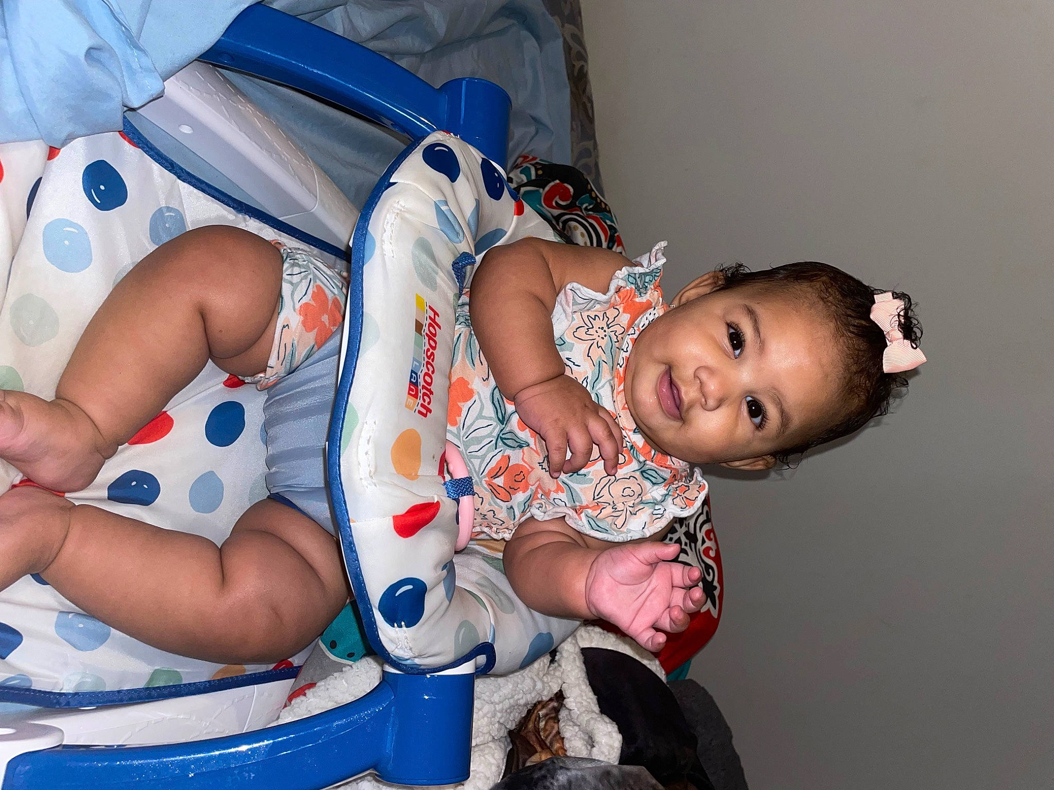 Jalayna is registered to the contest to win money with this photo: arm, baby, baby_toddler_clothing, blue, child, comfort, elbow, event, eye, finger, flash_photography, fun, happy, human_body, mouth, person, sitting, skin, thigh, toddler