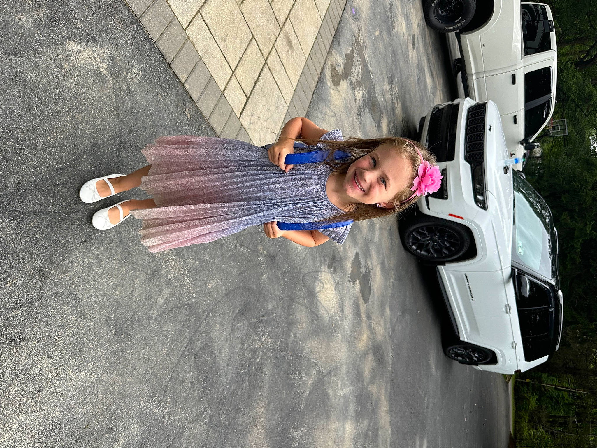 Evianna is registered to the contest to win money with this photo: asphalt, auto_part, automotive_design, automotive_exterior, automotive_lighting, automotive_tire, bumper, car, dress, electric_blue, family_car, hood, joy, luxury_vehicle, motor_vehicle, person, personal_luxury_car, smile, tire, trunk