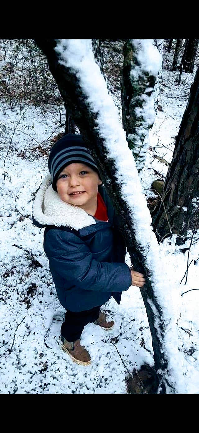 Clay joined the competition — help win amazing prizes! baby, baby_toddler_clothing, bonnet, branch, cheek, child_model, freezing, headwear, hood, human, jacket, joy, mouth, nose, people_in_nature, person, playing_in_the_snow, portrait_photography, precipitation, snow