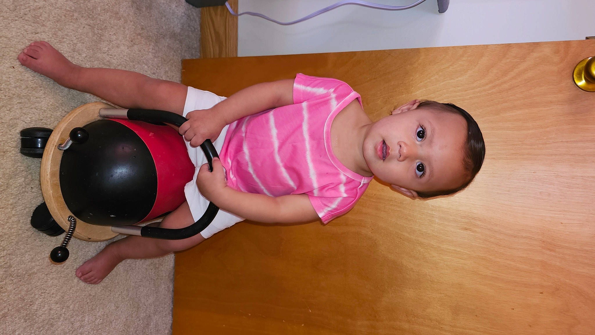 Skylar joined the competition — help win amazing prizes! abdomen, baby, baby_products, baby_toddler_clothing, cheek, chest, child, comfort, flooring, foot, fun, hardwood, human_leg, joint, knee, leg, person, pink, thigh, toddler