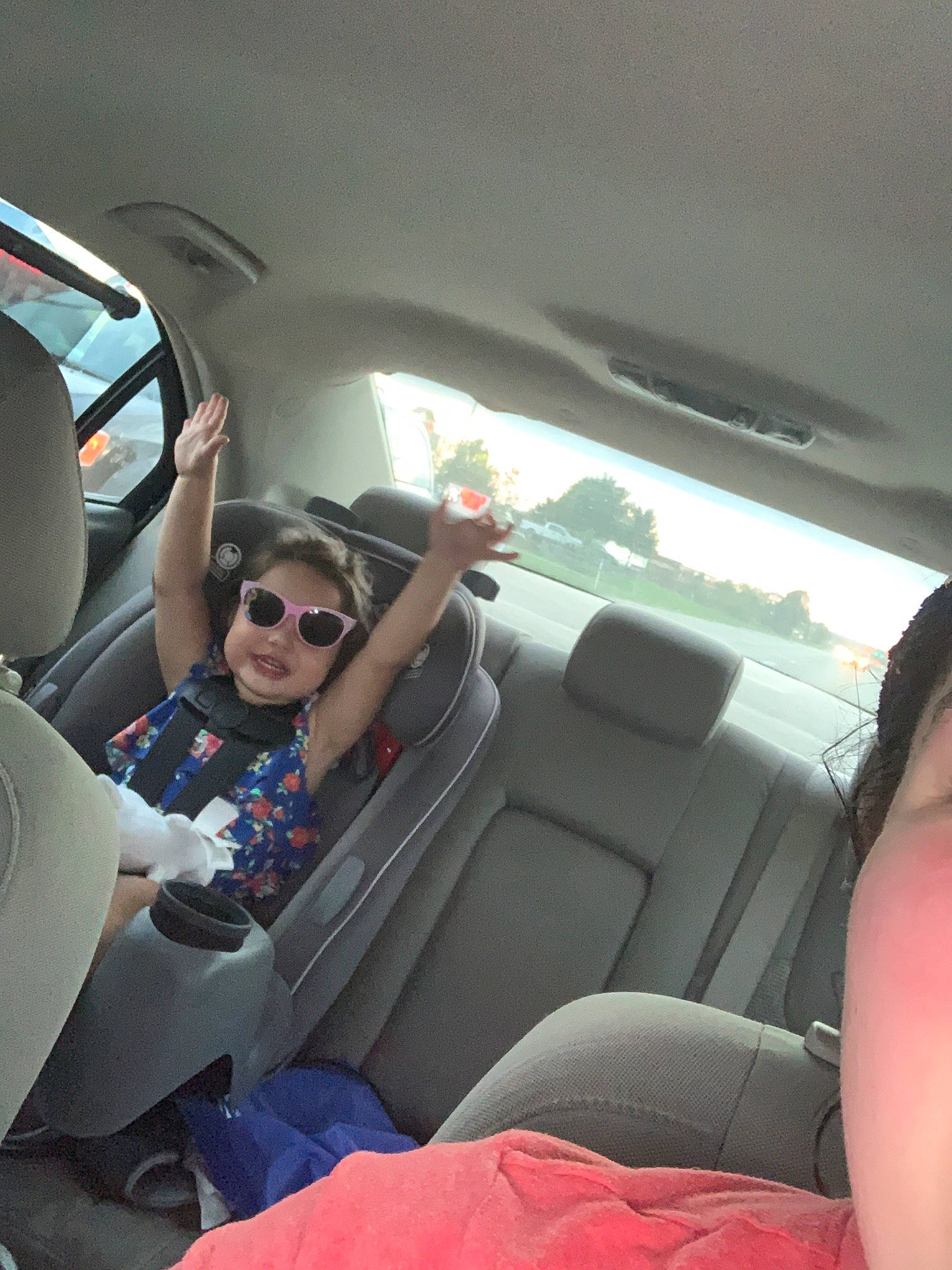 Ava joined the competition — help win amazing prizes! auto_part, car, car_seat, car_seat_cover, driving, eyewear, family_car, glasses, head_restraint, joy, luxury_vehicle, passenger, person, sunglasses, vehicle, vehicle_door