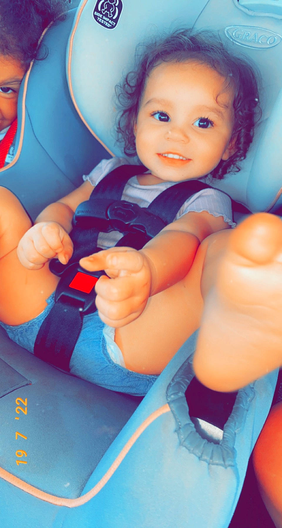 Zakyra is registered to the contest to win money with this photo: azure, blue, cheek, facial_expression, finger, gesture, happy, head, human_body, joint, joy, leg, mouth, nail, nose, person, pink, skin, smile, thumb