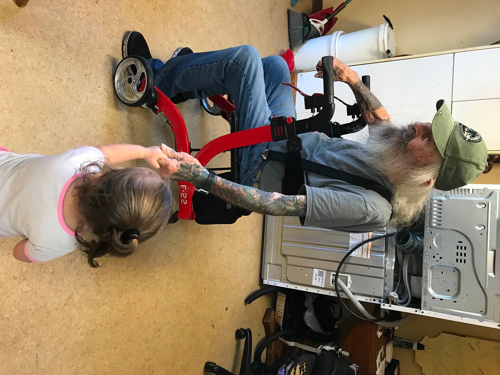 Delylah is registered to the contest to win money with this photo: arm, auto_part, automotive_design, automotive_tire, automotive_wheel_system, boot, elbow, engineering, hat, human_leg, knee, machine, motor_vehicle, person, service, tire, walking_shoe, wheel