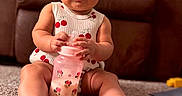 Naomi joined the competition — help win amazing prizes! baby, bottle, carpet, child, clothing, couch, cute, expression, face, floor, hands, home, indoors, infant, legs, minnie_mouse, person, pink, sitting, toy