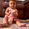 Naomi joined the competition — help win amazing prizes! baby, child, bottle, pink, carpet, sitting, indoors, couch, toy, floor, cute, person, minnie_mouse, clothing, infant, face, legs, hands, expression, home