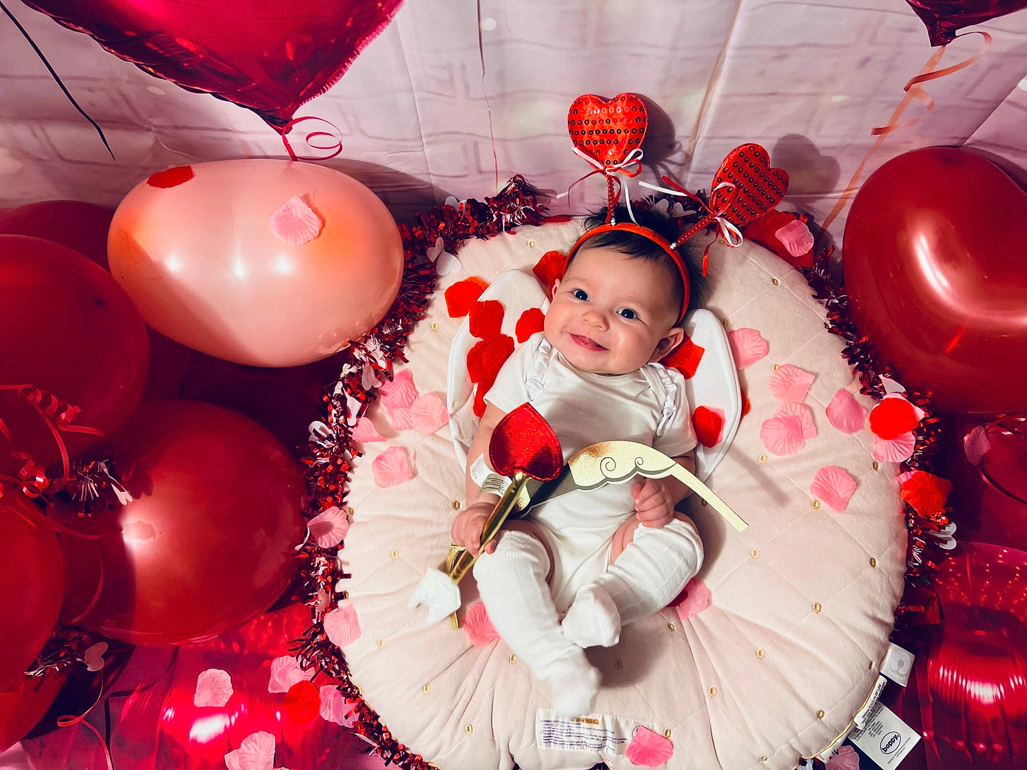 Harmoney joined the competition — help win amazing prizes! baby, baby_toddler_clothing, balloon, christmas_decoration, christmas_eve, christmas_ornament, decoration, event, fun, happy, holiday, joy, magenta, ornament, party_supply, person, petal, pink, red, room