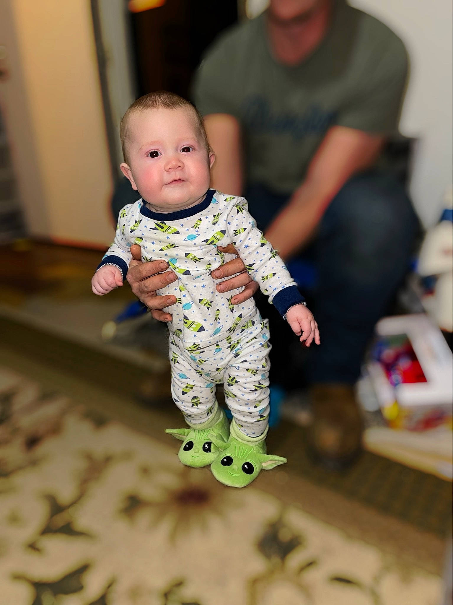 Jaxton is registered to the contest to win money with this photo: baby, baby_toddler_clothing, child, cleanliness, event, flooring, foot, fun, happy, hardwood, pattern, person, play, room, sitting, sleeve, t_shirt, toddler, wood