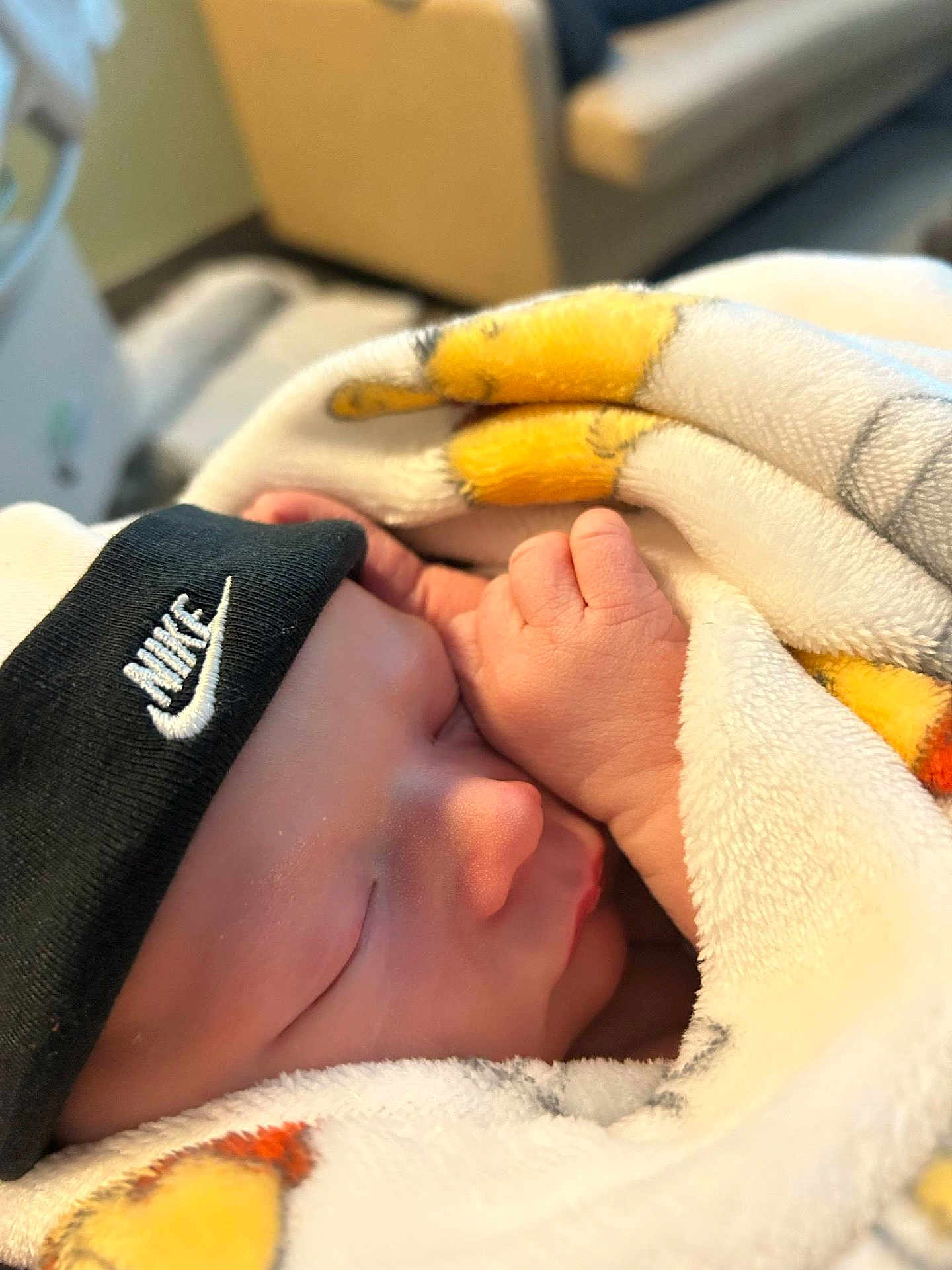 Kegan is registered to the contest to win money with this photo: newborn, baby, sleeping, blanket, beanie, nike, cozy, fist, cute, infant, soft, warm, closeup, indoor, rest, peaceful, child, wrapped, portrait, headwear