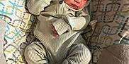 Dallas joined the competition — help win amazing prizes! baby, sleeping, infant, onesie, cushion, patterned, seat, cozy, peaceful, newborn, resting, child, soft, comfort, indoors, cute, small, relaxed, person, portrait