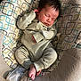 baby, sleeping, infant, onesie, cushion, patterned, seat, cozy, peaceful, newborn, resting, child, soft, comfort, indoors, cute, small, relaxed, person, portrait
