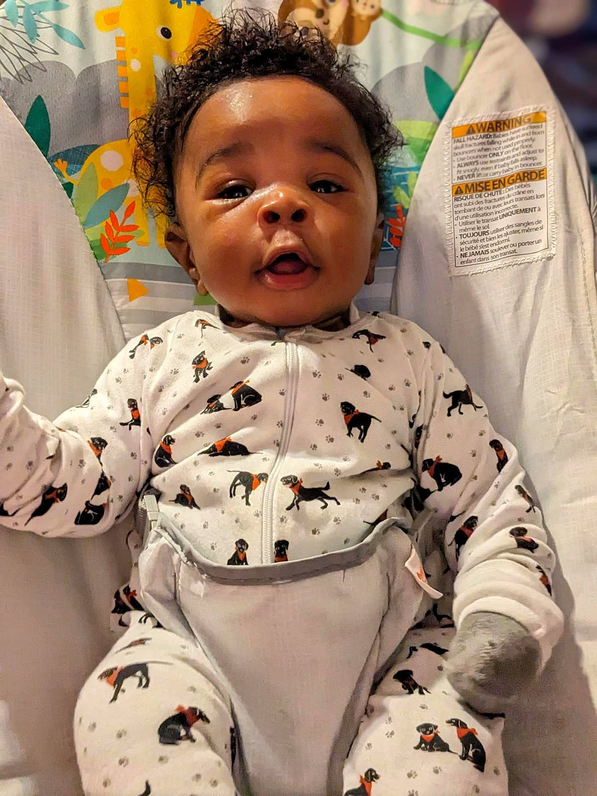 Myles joined the competition — help win amazing prizes! baby, baby_toddler_clothing, cheek, child, face, facial_expression, fun, gesture, hairstyle, happy, head, human_body, outerwear, person, sitting, skin, sleeve, textile, toddler, uniform