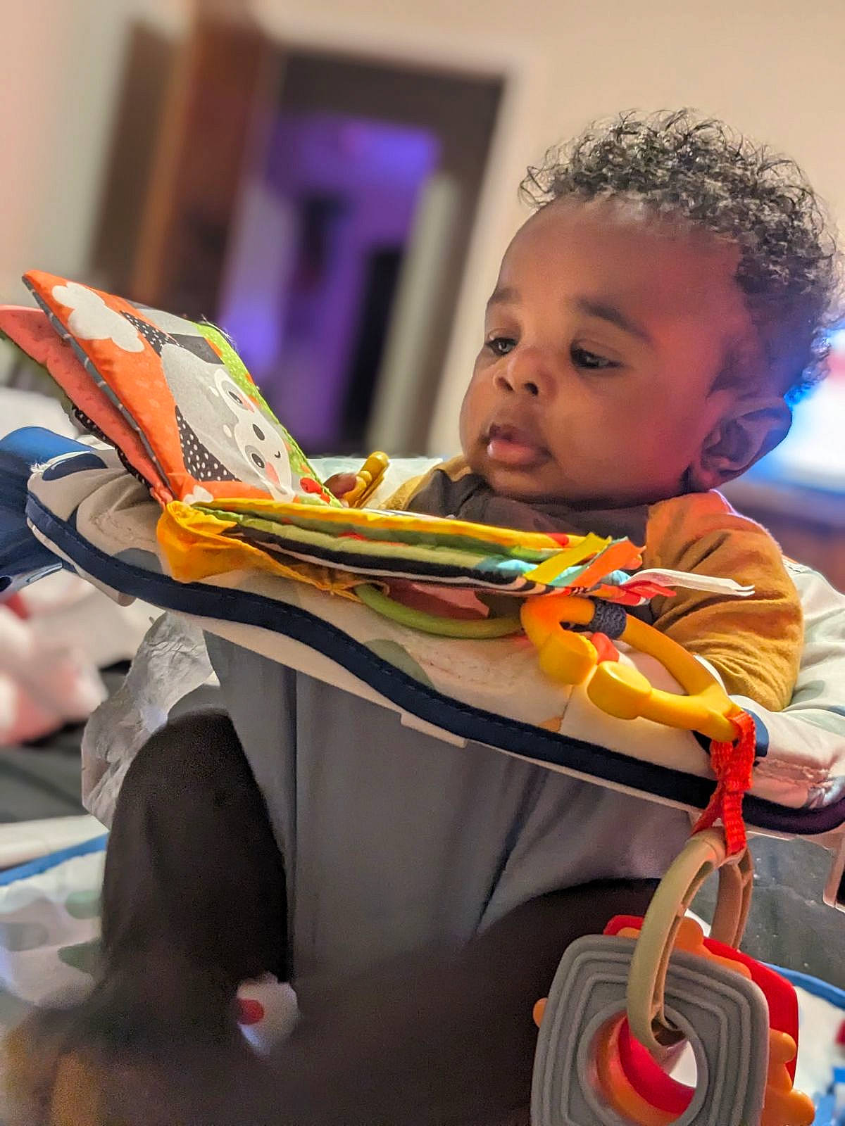 Myles joined the competition — help win amazing prizes! book, child, education, event, fun, happy, human, job, laptop, learning, leisure, person, play, publication, reading, recreation, room, sitting, toddler