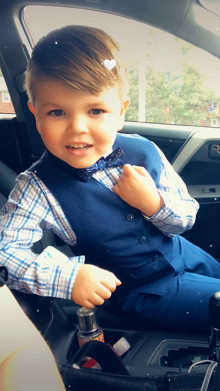 Javien joined the competition — help win amazing prizes! auto_part, automotive_design, automotive_exterior, automotive_lighting, electric_blue, family_car, flash_photography, hairstyle, hand, happy, motor_vehicle, person, personal_luxury_car, plaid, skin, smile, steering_wheel, tartan, toddler, vehicle_door