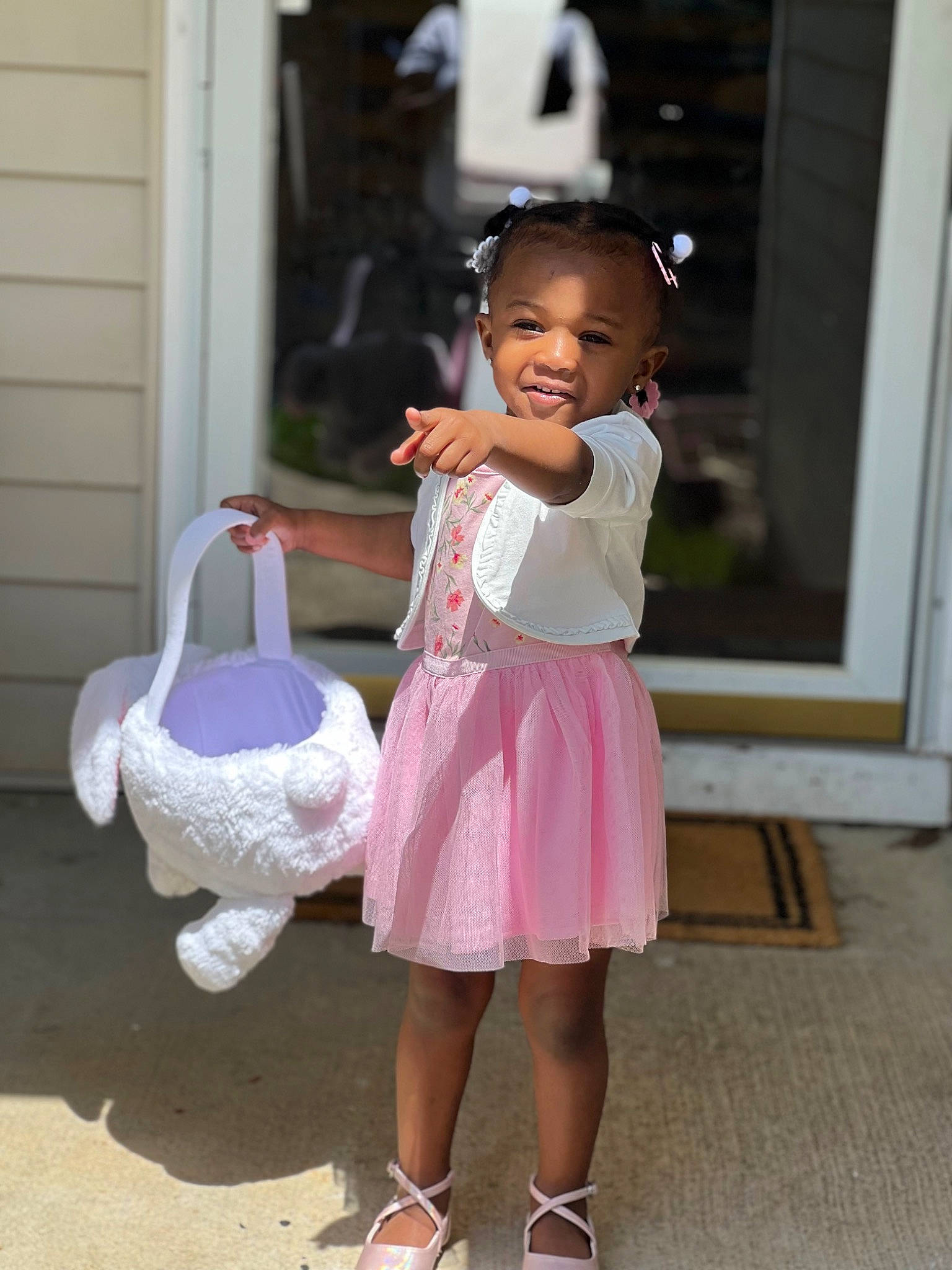 Serenity is registered to the contest to win money with this photo: baby_toddler_clothing, bag, child, costume, event, fun, happy, leisure, luggage_and_bags, magenta, person, pink, room, sandal, shoulder, sitting, smile, standing, t_shirt, toddler