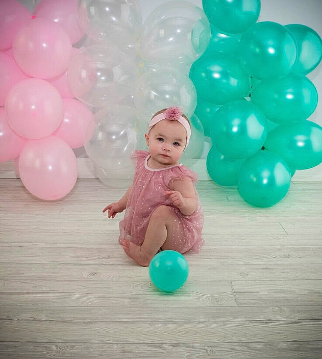 Amariana joined the competition — help win amazing prizes! balloon, child, headwear, party, party_supply, person, pink, smile, toddler, toy