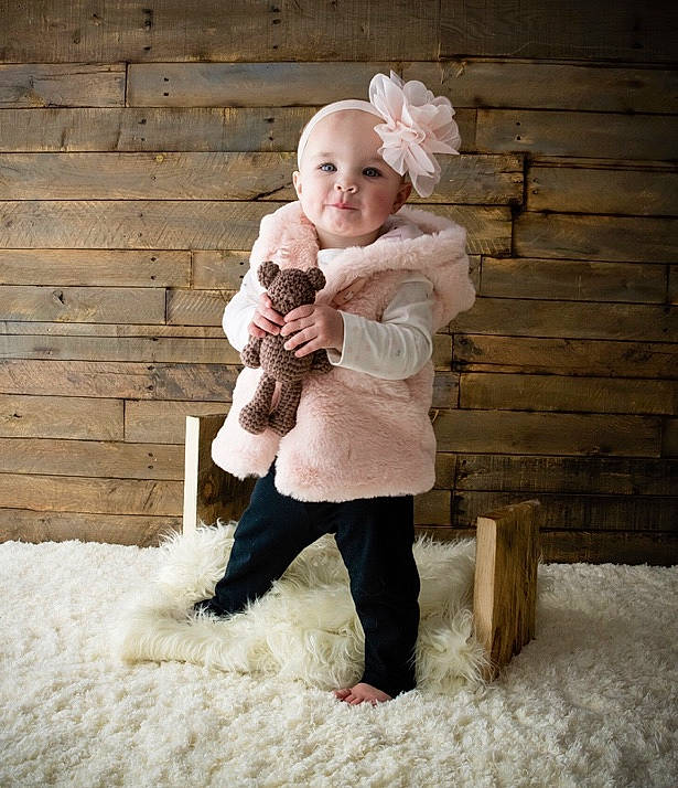 Amariana is registered to the contest to win money with this photo: baby, child, family, fur, headwear, people, person, photograph, photography, play, playing_in_the_snow, smile, snapshot, snow, toddler, winter
