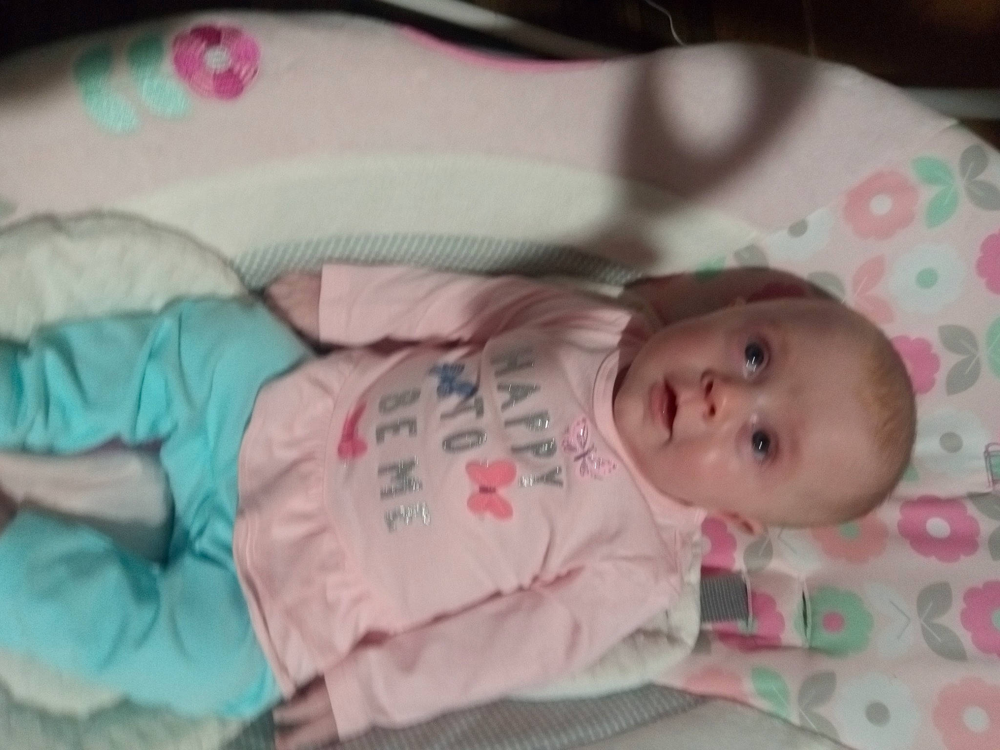 Jaycee is registered to the contest to win money with this photo: baby, baby_products, baby_toddler_clothing, cheek, child, comfort, eye, head, human_body, iris, linens, lip, pattern, person, pink, product, room, skin, sleeve, surprise