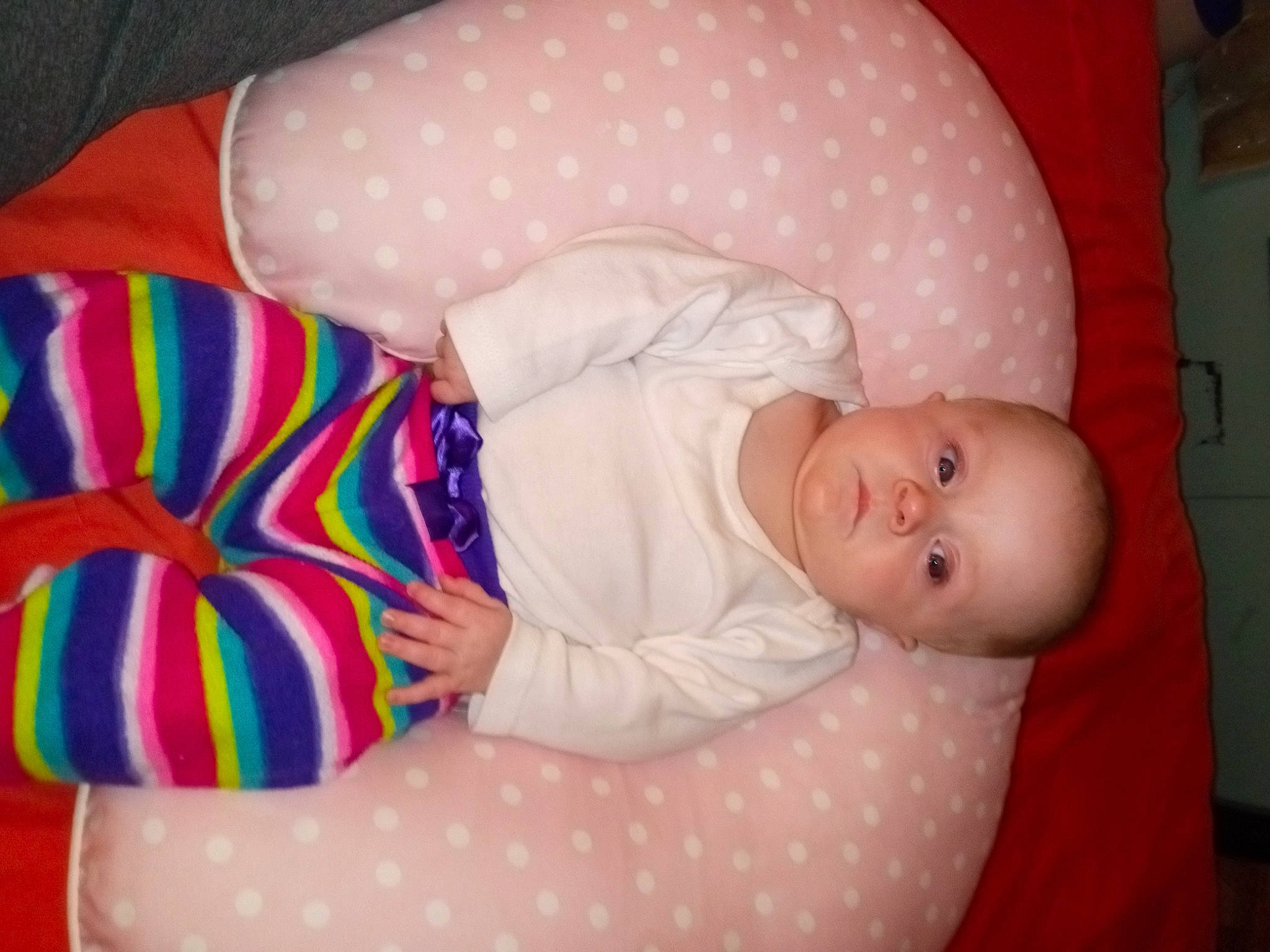 Jaycee is registered to the contest to win money with this photo: arm, baby, baby_products, baby_sleeping, baby_toddler_clothing, child, comfort, eye, finger, hand, head, human_body, linens, nail, pattern, person, pink, skin, sleeve, textile