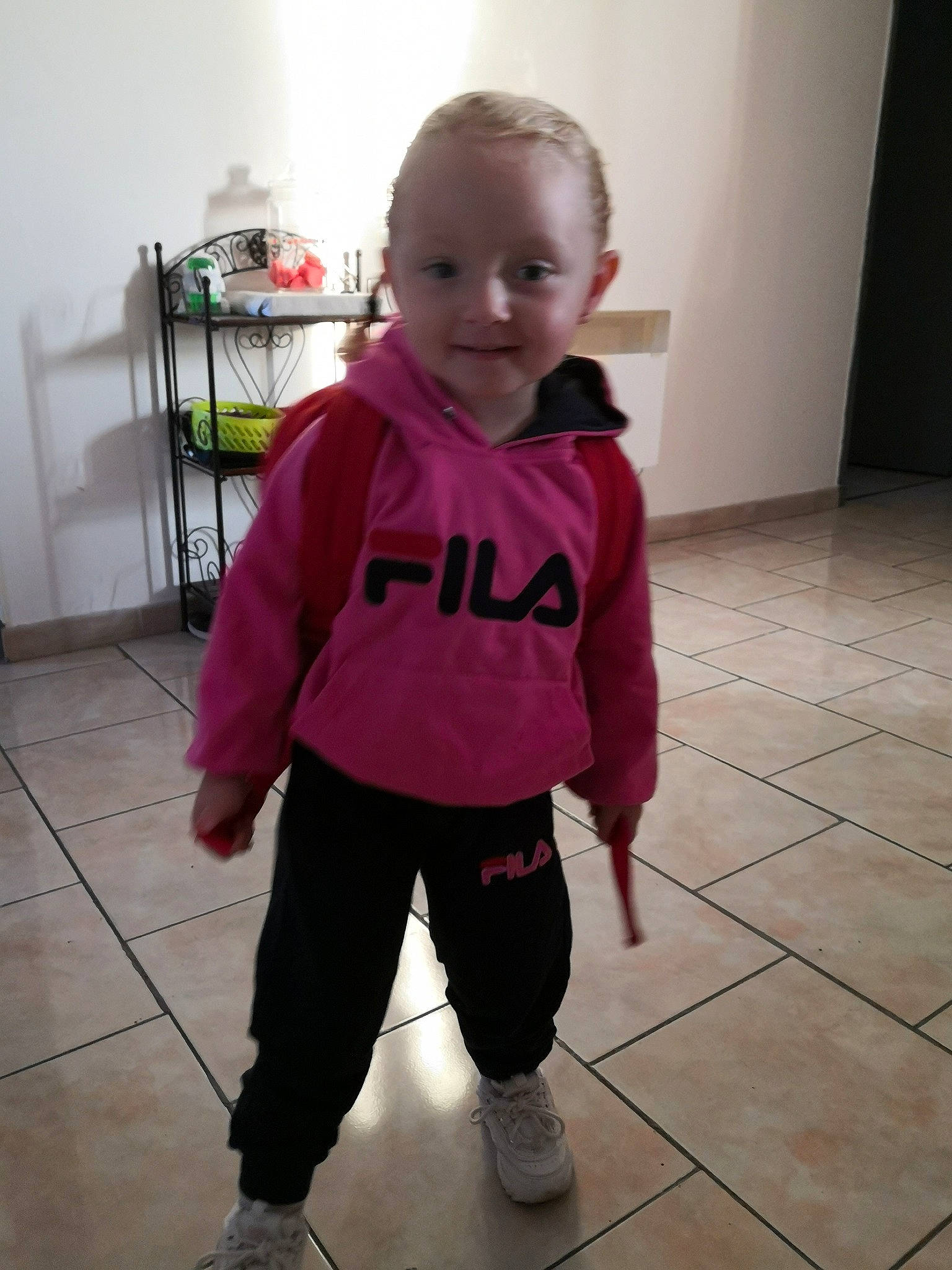 Lena a rejoint le concours — aidez-le/la à gagner de superbes lots ! baby, child, floor, flooring, joint, magenta, outerwear, person, pink, shoulder, skin, sleeve, standing, t_shirt, toddler