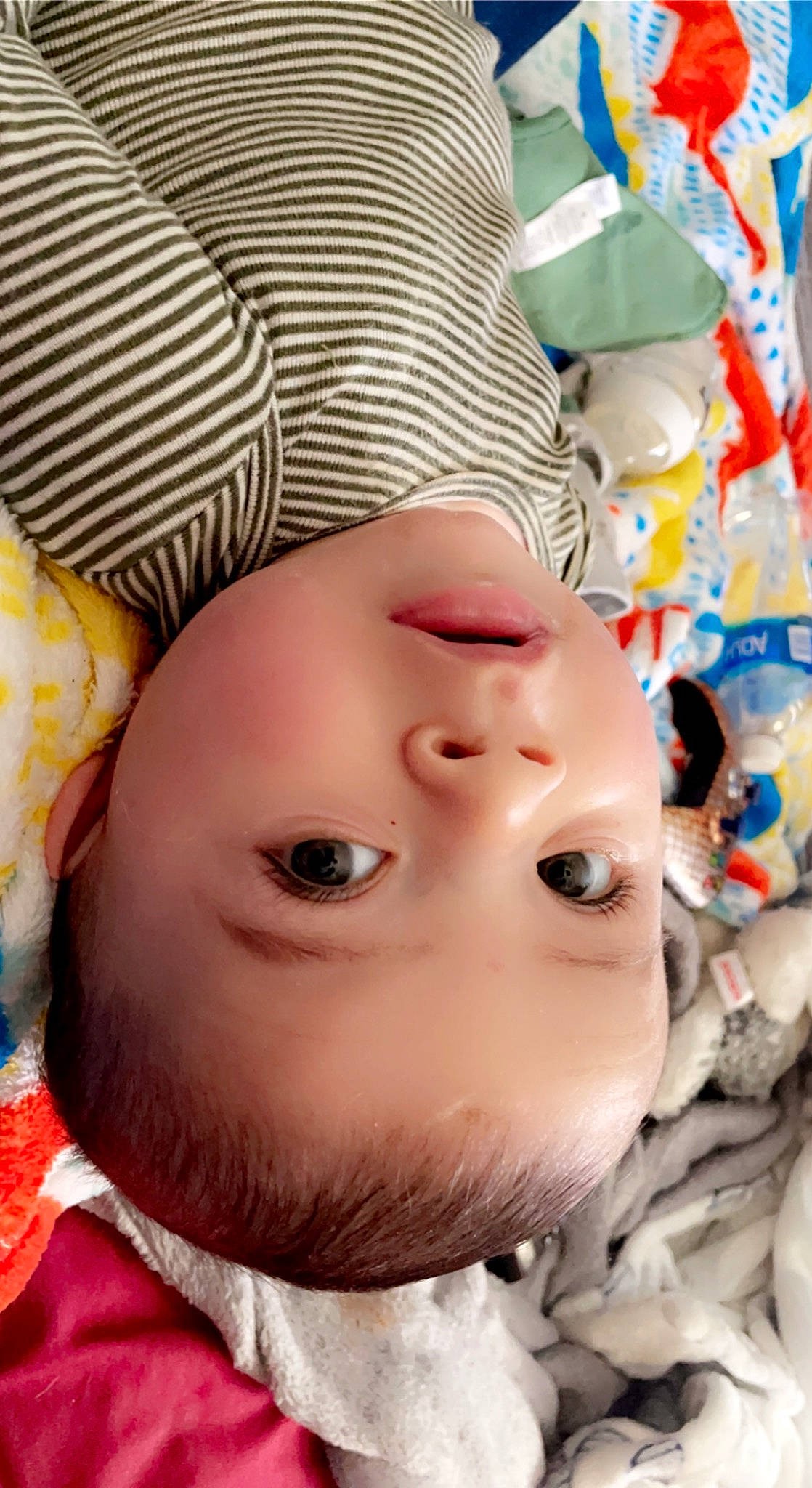 Fenix is registered to the contest to win money with this photo: baby, baby_toddler_clothing, cheek, child, chin, close_up, eyelash, facial_expression, fun, happy, headgear, lip, mouth, nose, pattern, person, pink, skin, textile, toddler