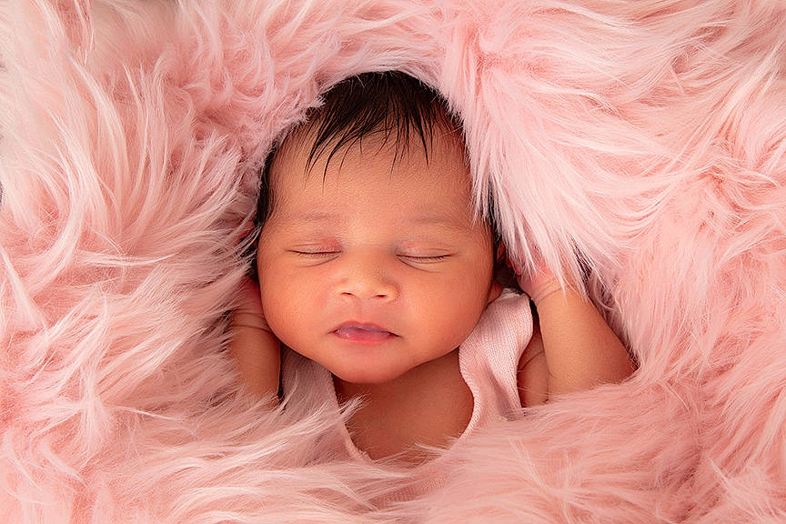 Ayvah is registered to the contest to win money with this photo: baby, baby_toddler_clothing, bed, blond, brown_hair, close_up, comfort, eyebrow, eyelash, flash_photography, fur, gesture, hair, happy, iris, lip, nose, person, pink, smile