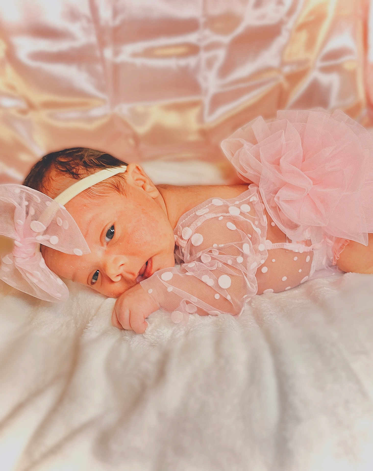 Lillian joined the competition — help win amazing prizes! baby, infant, pink, bow, headband, polka_dot, tulle, soft_blanket, portrait, cute, newborn, sleepy, resting, fabric, texture, closeup, indoor, child, adorable, baby_girl