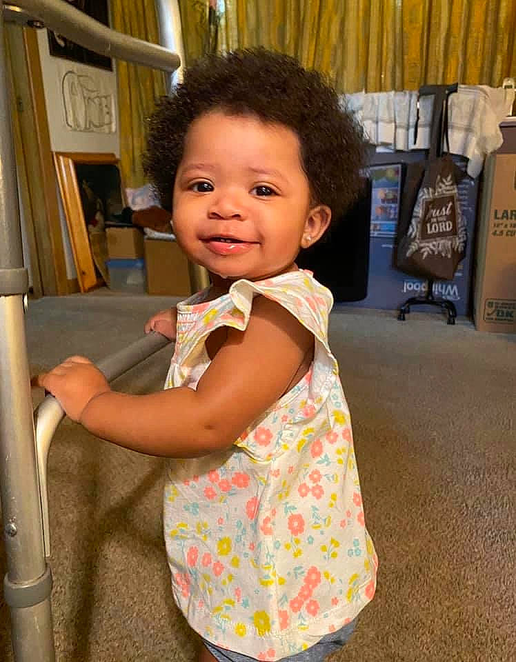 Amara joined the competition — help win amazing prizes! baby, child, joy, person, shoulder, skin, smile, standing, toddler