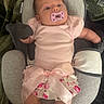 Alora is registered to the contest to win money with this photo: baby, baby_seat, blanket, bow, child, comfortable, cushion, cute, floral_skirt, indoors, infant, mittens, newborn, pacifier, pink_clothing, portrait, resting, sleepwear, small_arms, soft_texture