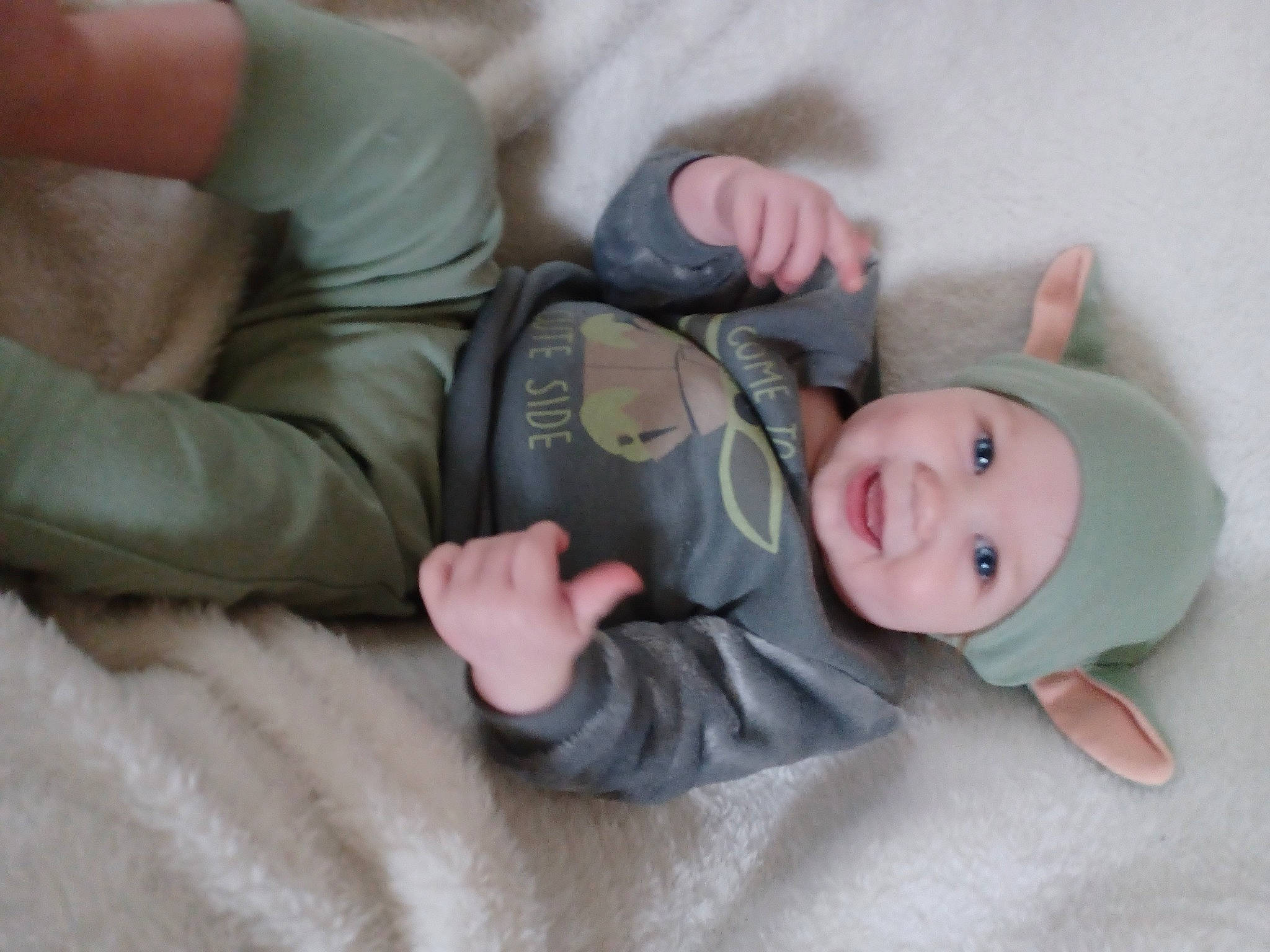 Delaney joined the competition — help win amazing prizes! baby, baby_toddler_clothing, cheek, child, comfort, eye, face, finger, gesture, hand, hat, head, headwear, human_body, joy, nose, person, skin, sleeve, smile