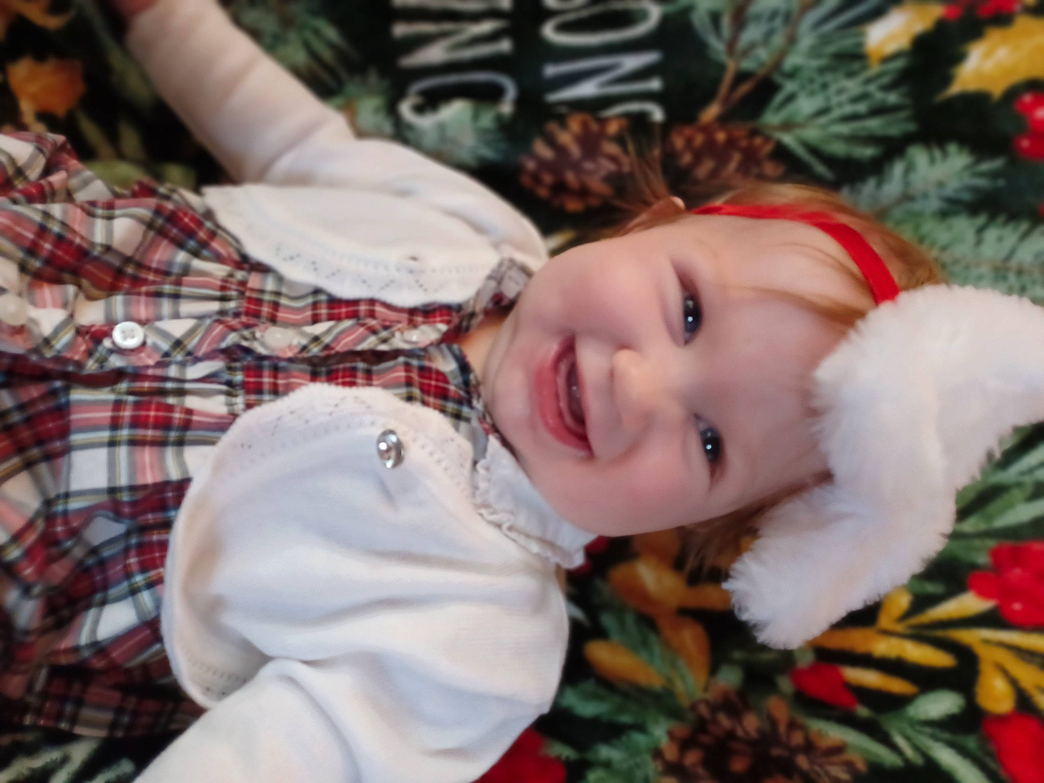 Delaney joined the competition — help win amazing prizes! cheek, child, christmas, event, eye, fun, fur, grass, happy, head, headwear, joy, pattern, people_in_nature, person, plaid, plant, portrait_photography, smile, tartan