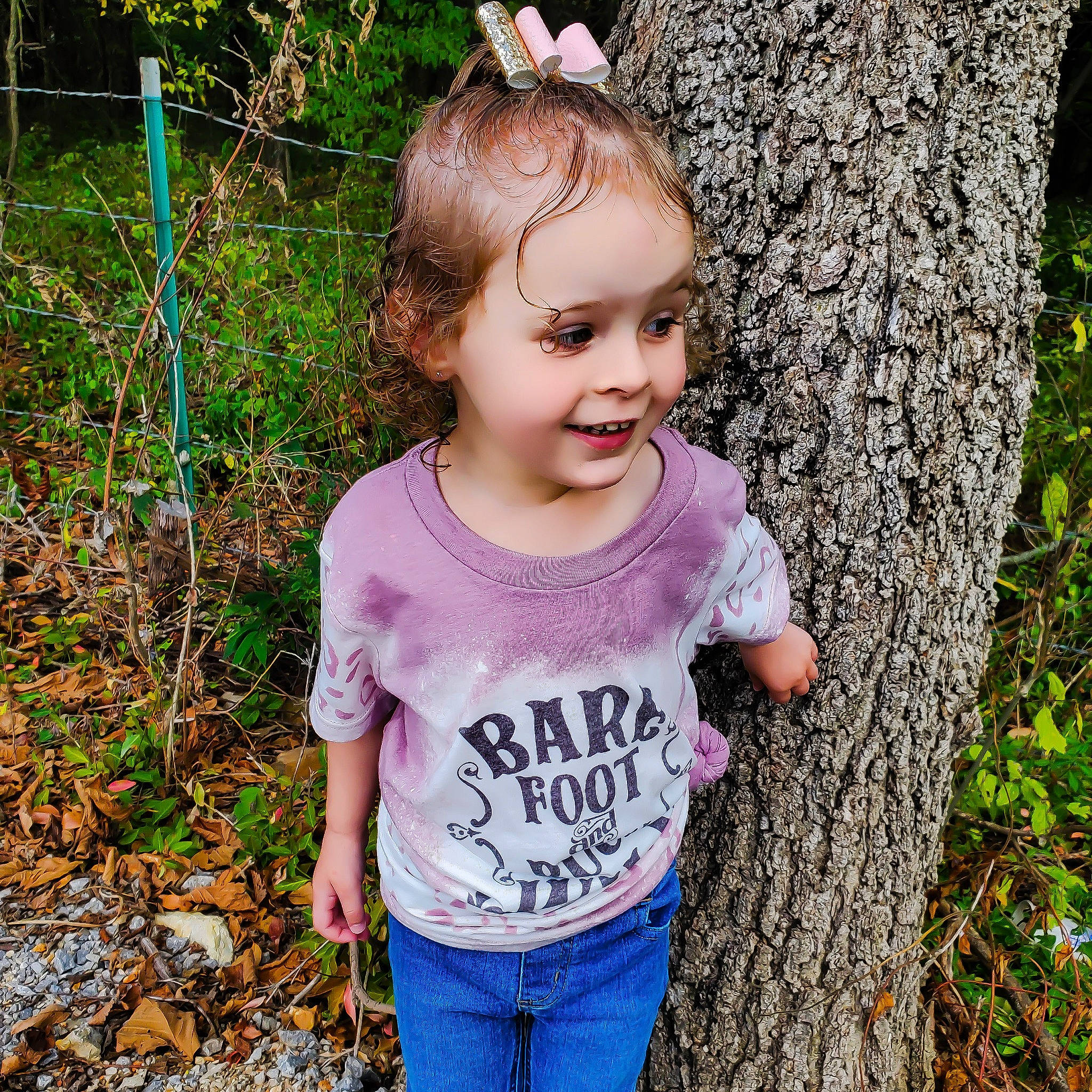 Payton joined the competition — help win amazing prizes! baby_toddler_clothing, botany, clothing, face, grass, hairstyle, happy, head, jeans, joy, leaf, mammal, people_in_nature, person, pink, plant, sleeve, smile, standing, t_shirt