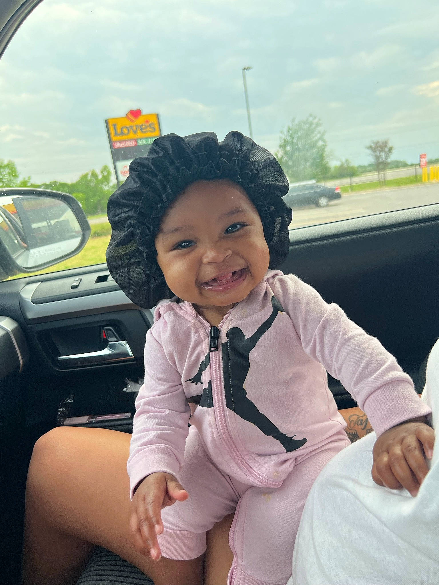 Kamari joined the competition — help win amazing prizes! auto_part, automotive_design, automotive_exterior, car, car_seat, cloud, family_car, fun, gesture, happy, headwear, joy, leisure, motor_vehicle, person, sky, smile, steering_wheel, toddler, travel