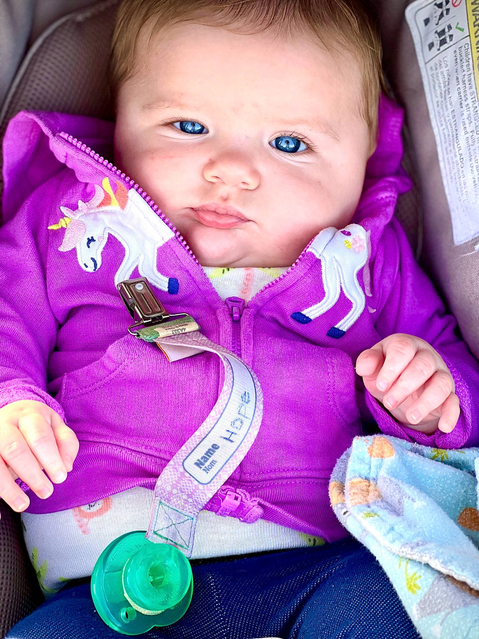 Hope joined the competition — help win amazing prizes! baby, baby_carriage, baby_in_car_seat, baby_toddler_clothing, cheek, child, face, finger, green, happy, mouth, nose, outerwear, person, pink, purple, skin, sleeve, textile, toddler