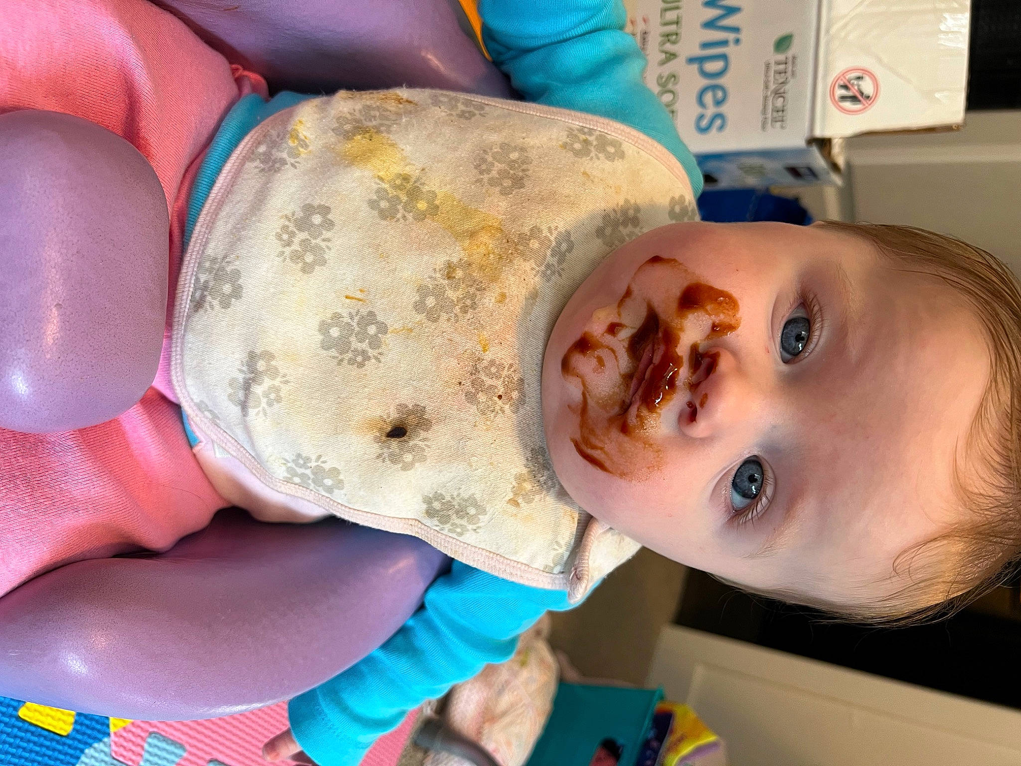 Hope is registered to the contest to win money with this photo: baby, baby_products, baby_toddler_clothing, blue, cheek, chest, child, drinkware, eyelash, happy, hat, mouth, musical_instrument, nail, nose, organ, person, plastic_bottle, skin, thumb