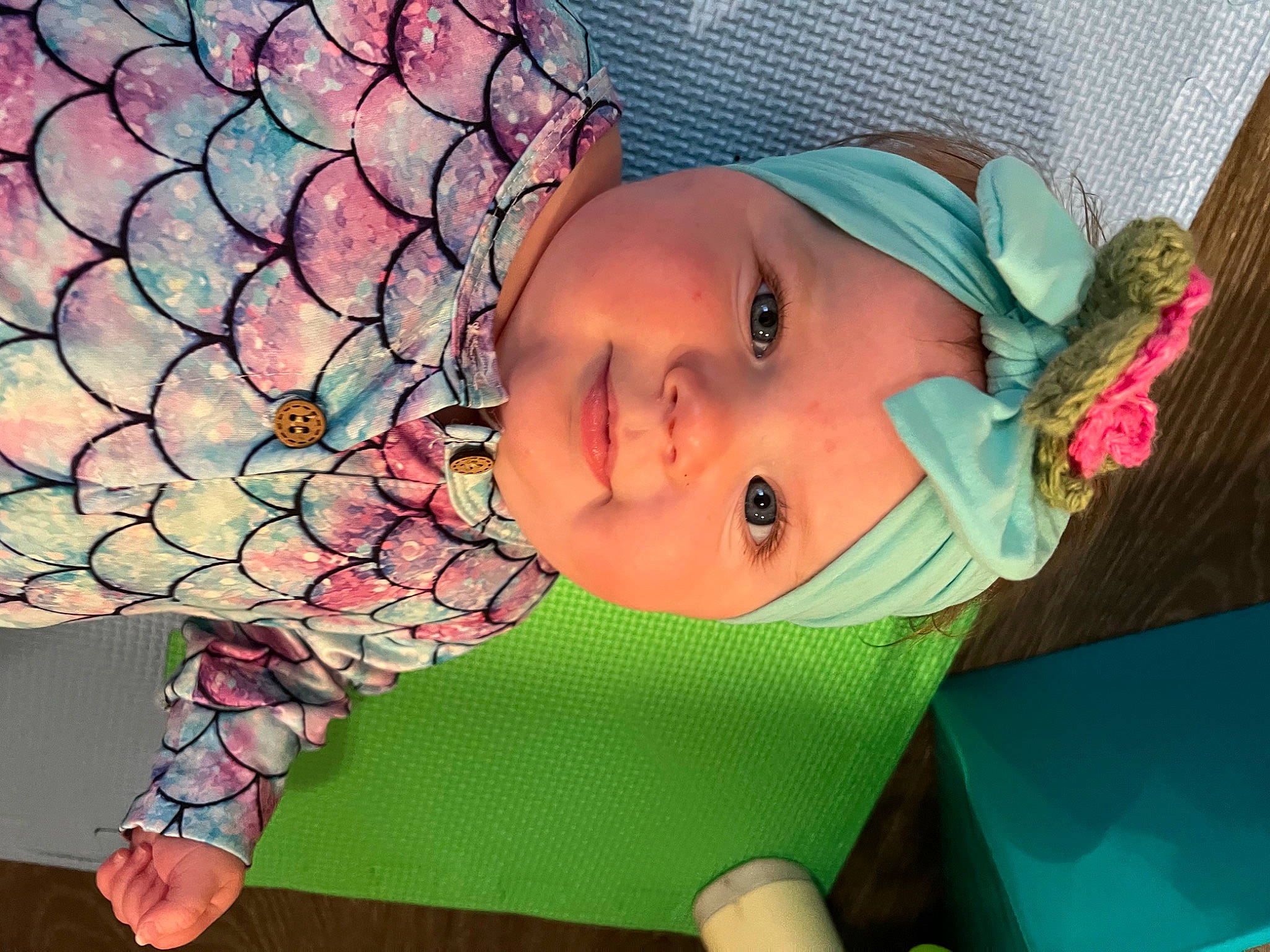 Hope is registered to the contest to win money with this photo: baby, baby_toddler_clothing, cheek, child, eye, face, flower, fun, grass, green, head, headwear, leaf, leisure, nose, pattern, person, pink, skin, textile