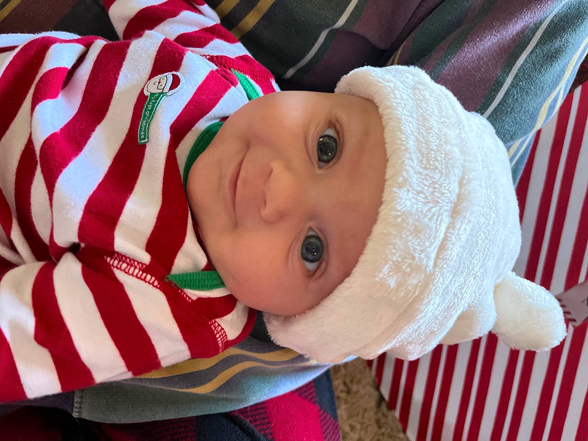 Samuel Lee is registered to the contest to win money with this photo: baby, baby_toddler_clothing, beanie, cap, carmine, cheek, child, comfort, event, fashion_accessory, fun, happy, hat, headwear, lip, nose, pattern, person, sleeve, sun_hat