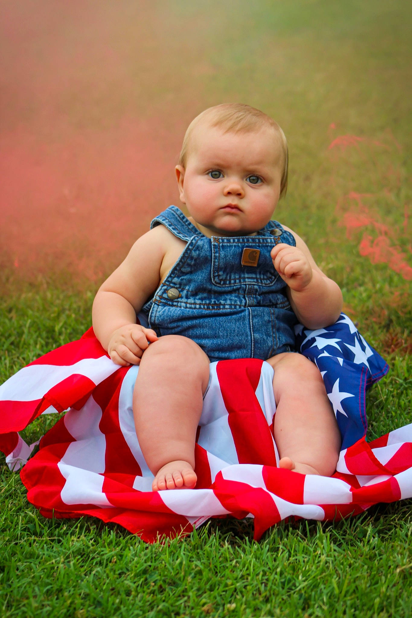 Samuel is registered to the contest to win money with this photo: baby_toddler_clothing, child, dress, finger, flash_photography, fun, grass, hand, happy, human_body, lap, leg, leisure, people_in_nature, person, plant, shoe, shorts, skin, thigh