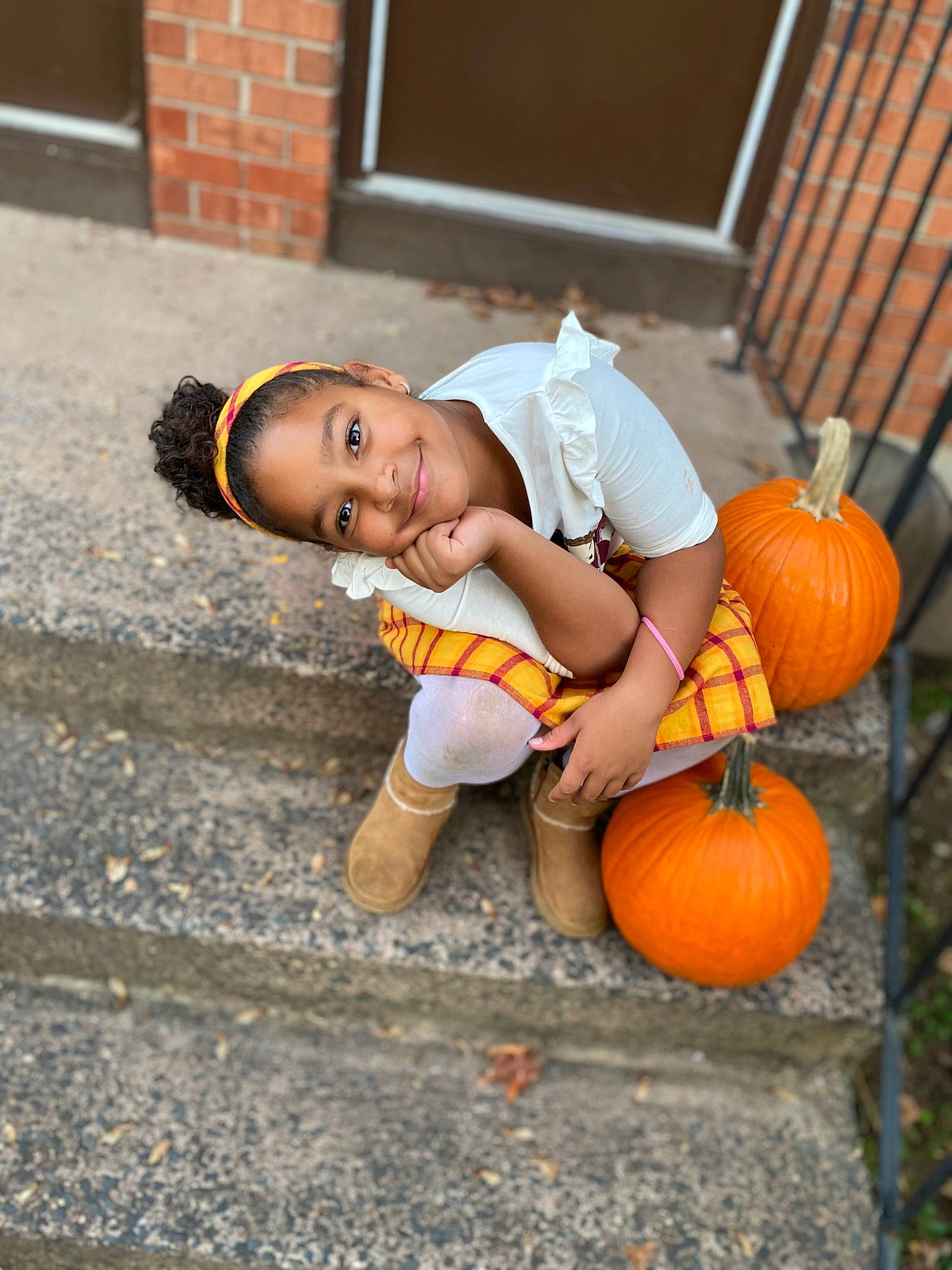 Kamyiah joined the competition — help win amazing prizes! arm, calabaza, cucurbita, dress, eye, face, flooring, gourd, grass, hand, happy, head, human_body, joy, natural_foods, orange, person, plant, pumpkin, tree