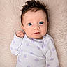 baby, infant, face, blue_eyes, spiky_hair, white_clothing, purple_pattern, onesie, soft_blanket, fluffy, portrait, cute, looking_at_camera, indoors, child, newborn, skin, hand, expression, lying_down