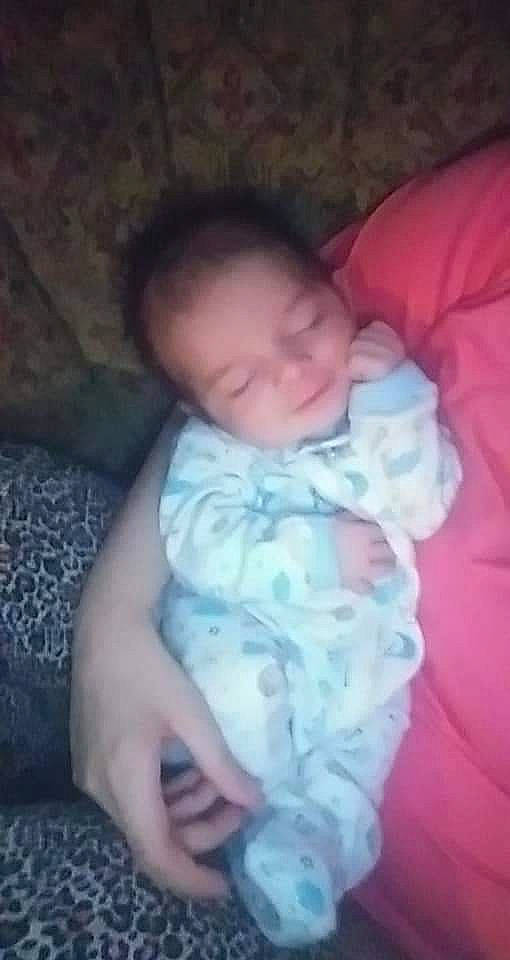 Nikolai joined the competition — help win amazing prizes! baby, baby_toddler_clothing, bedtime, cheek, child, chin, comfort, electric_blue, eyebrow, finger, fun, human_body, iris, linens, mouth, nose, person, sitting, skin, thumb