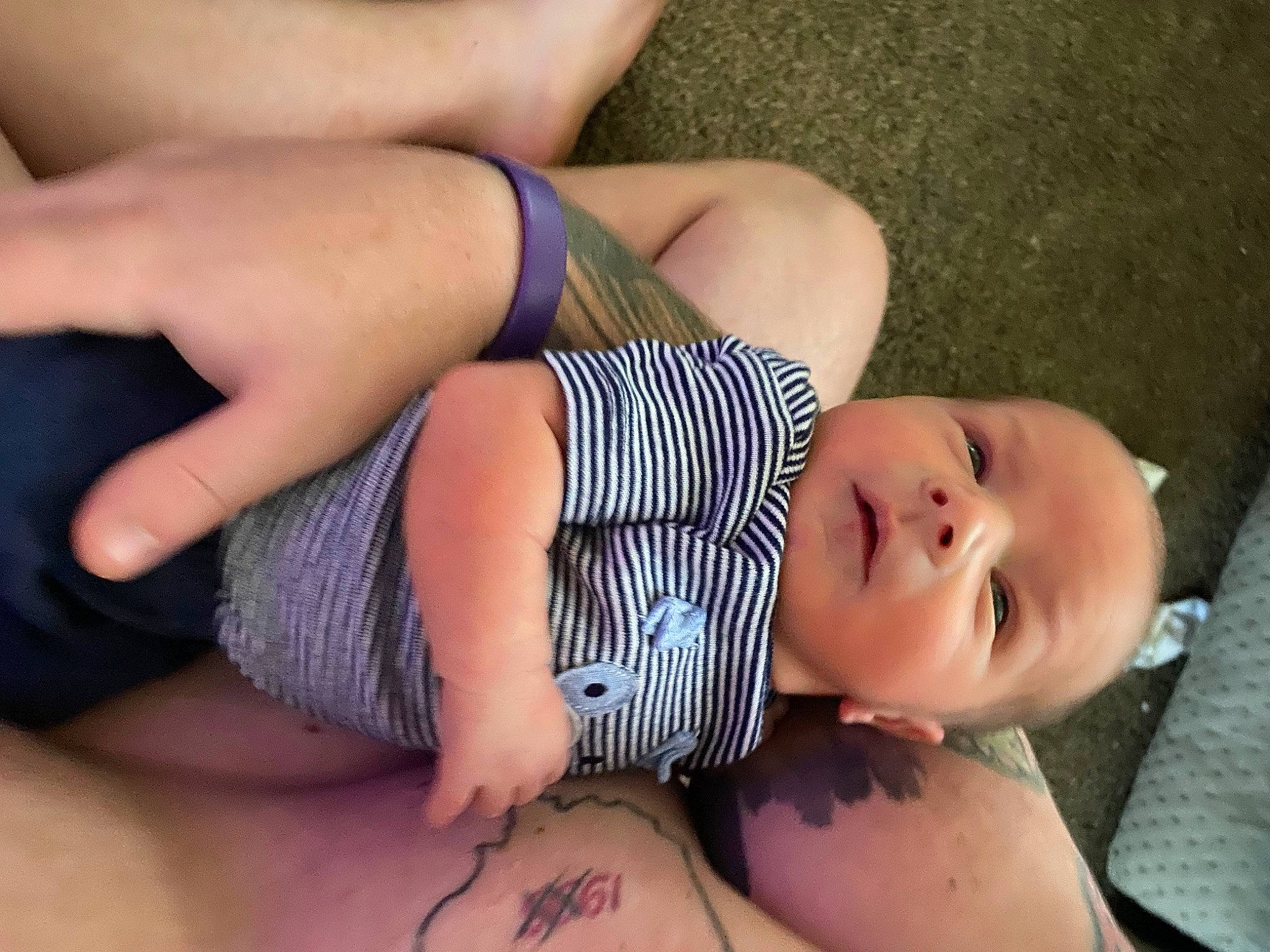 Killian is registered to the contest to win money with this photo: abdomen, baby, cheek, chest, eye, eyelash, finger, hair, hand, head, human_body, joint, leg, nail, neck, person, skin, stomach, thigh, toddler