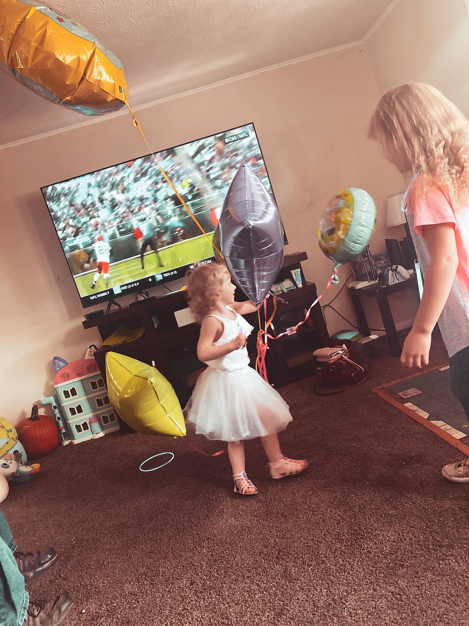 Katara joined the competition — help win amazing prizes! boot, ceiling, child, couch, entertainment, event, fashion_design, flooring, fun, happy, interior_design, leisure, luggage_and_bags, magenta, party_supply, person, pink, room, sandal, television