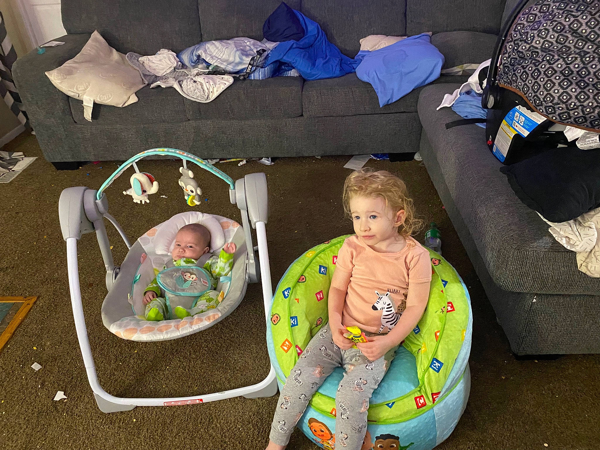 Katara is registered to the contest to win money with this photo: baby, baby_products, baby_toddler_clothing, baby_toys, bib, chair, child, circle, comfort, fun, grass, lap, person, play, room, sitting, toddler, vertebrate