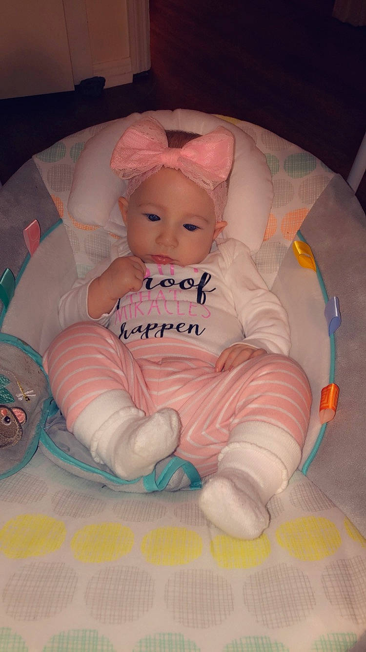 Katara is registered to the contest to win money with this photo: baby, cheek, child, person, product, sitting, skin, toddler, toy