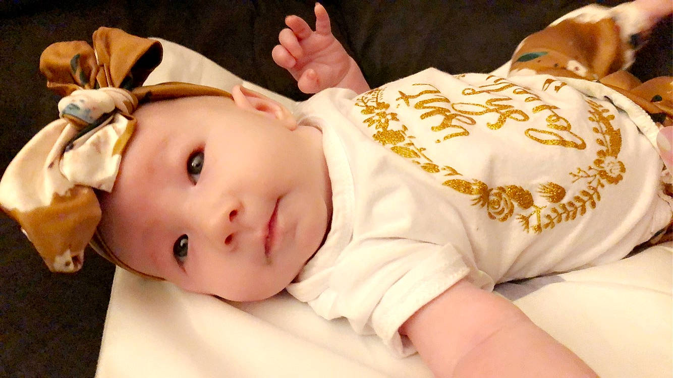 Katara is registered to the contest to win money with this photo: baby, child, ear, hair_accessory, head, headband, headgear, headwear, person, skin, toddler