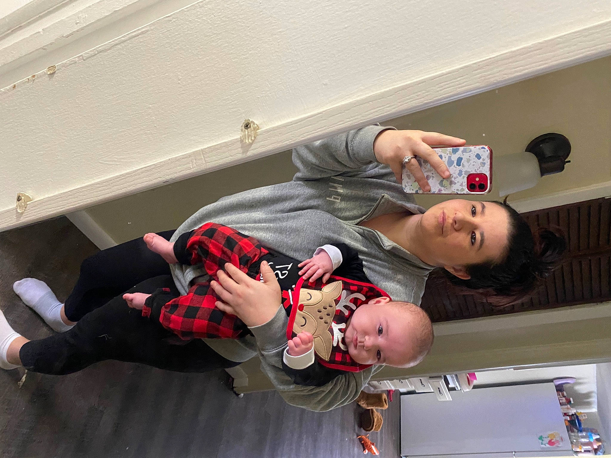 Killian joined the competition — help win amazing prizes! baby, boot, child, comfort, elbow, flooring, fun, human_leg, knee, leg, person, shoe, smile, sneakers, t_shirt, thigh, toddler